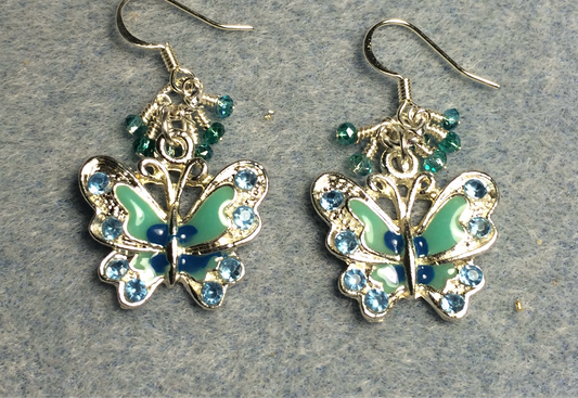 Silver and turquoise enamel and rhinestone butterfly charm earrings adorned with tiny dangling turquoise and teal Chinese crystal beads.