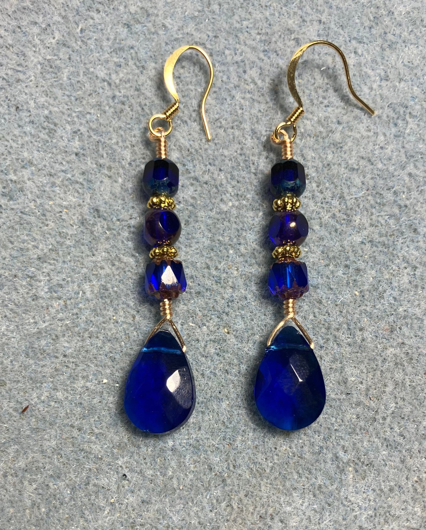 Cobalt blue Czech glass briolette bead earrings adorned with cobalt blue Czech glass beads.