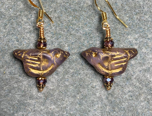 Translucent violet (with gold wash) Czech glass bird bead earrings adorned with violet Chinese crystal beads.