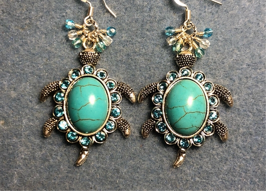 Large silver and turquoise gemstone and rhinestone turtle charm earrings adorned with small dangling turquoise and clear Czech glass beads.