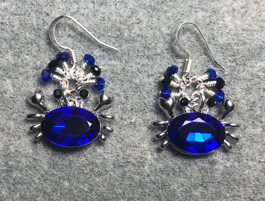 Silver and cobalt blue rhinestone crab charm earrings adorned with tiny dangling cobalt blue and black Chinese crystal beads.