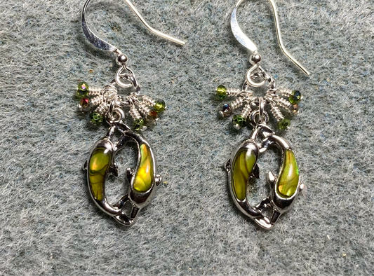 Small green abalone pair of dolphin charm earrings adorned with tiny dangling olive green Chinese crystal beads.