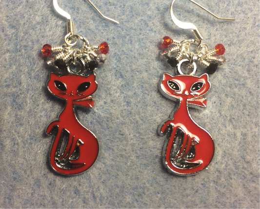 Red and black enamel cat charm earrings adorned with tiny dangling red, silver, and black Chinese crystal beads.