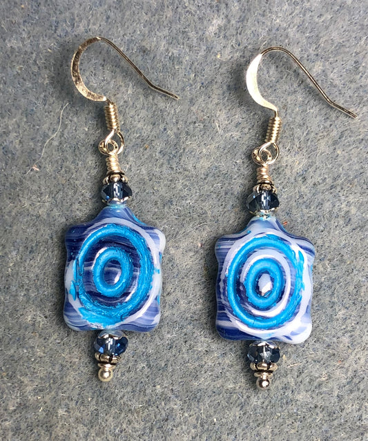 Dark and light blue Czech glass turtle bead earrings adorned with light blue Chinese crystal beads.