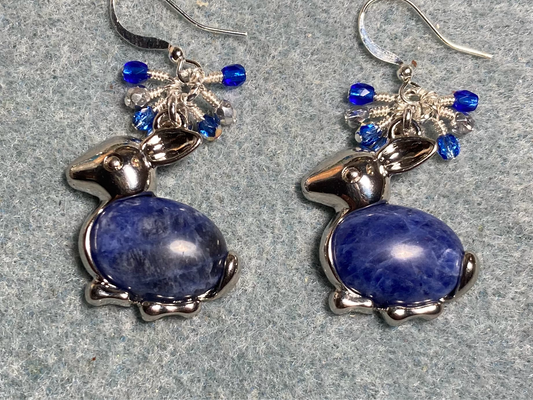 Large silver and blue sodalite gemstone rabbit charm earrings adorned with small dangling blue and silver Czech glass beads.