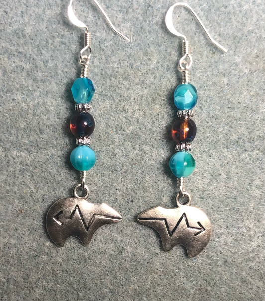 Silver Zuni bear charm earrings adorned with turquoise and brown Czech glass beads