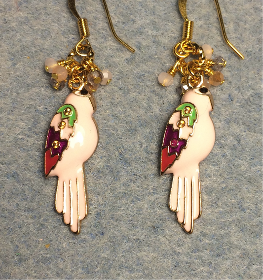 Light pink enamel parrot charm earrings adorned with tiny dangling light pink and peach Chinese crystal beads.