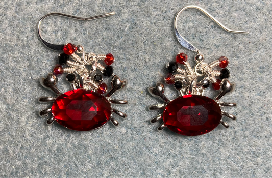 Silver and bright red rhinestone crab charm earrings adorned with tiny dangling red, silver, and black Chinese crystal beads.