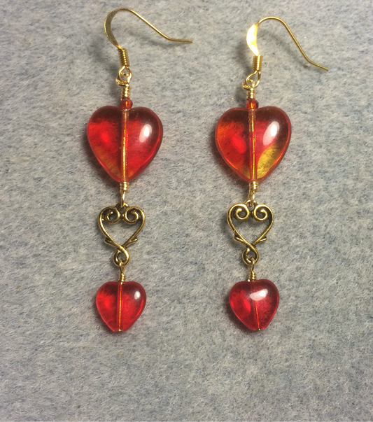 Large and small matching bright red Czech glass heart bead earrings joined by gold Tierracast heart connectors.