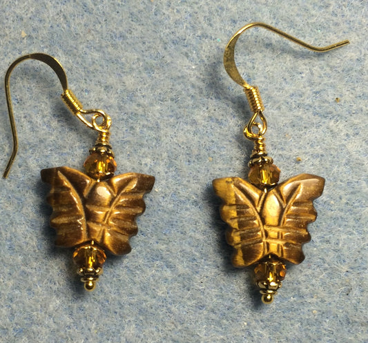 Small tigereye jade gemstone butterfly bead earrings adorned with amber Chinese crystal beads.