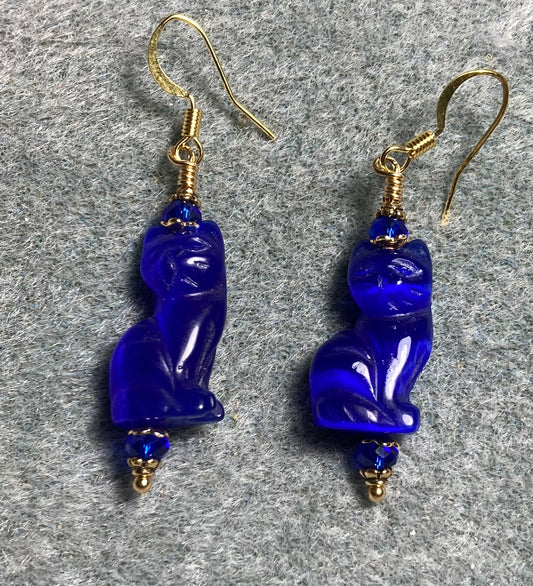 Dark blue fiber optic (cat’s eye) cat bead earrings adorned with dark blue Chinese crystal beads.