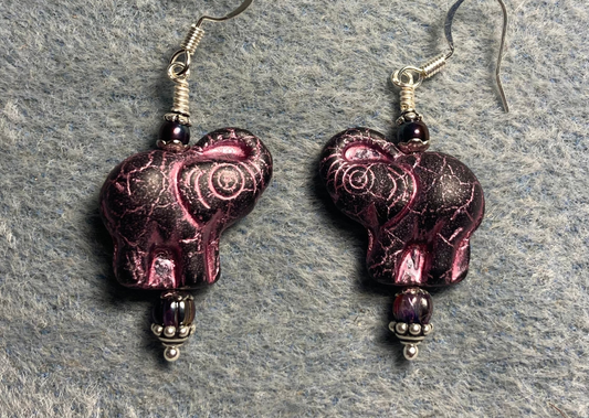 Purple (with pink inlay) Czech glass elephant bead earrings adorned with purple Czech glass beads.