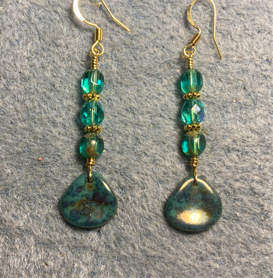 Teal green Czech glass rose petal earrings adorned with teal Czech glass beads.