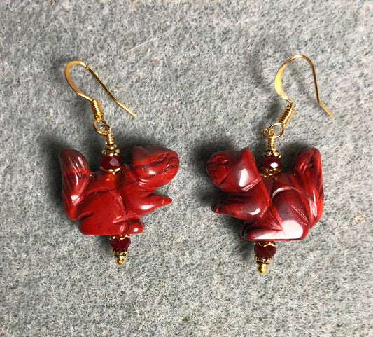 Red poppy jasper gemstone squirrel bead earrings adorned with dark red Chinese crystal beads.
