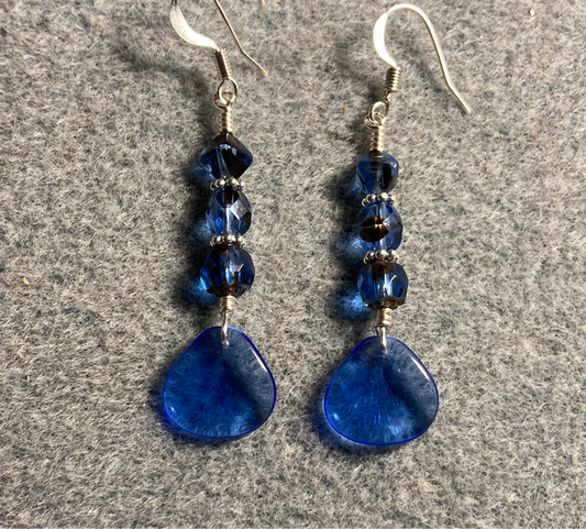 Translucent dark blue Czech glass rose petal earrings adorned with dark blue Czech glass beads.