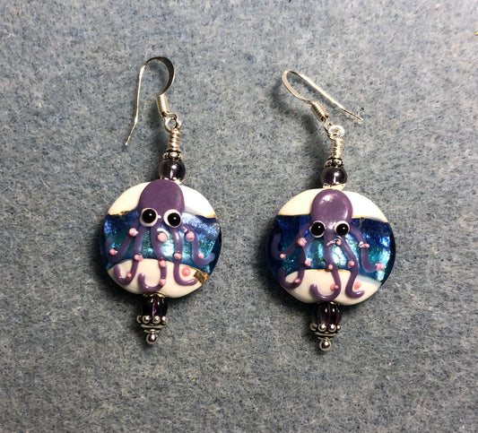 Purple and white lamp work octopus bead earrings adorned with purple Czech glass beads.