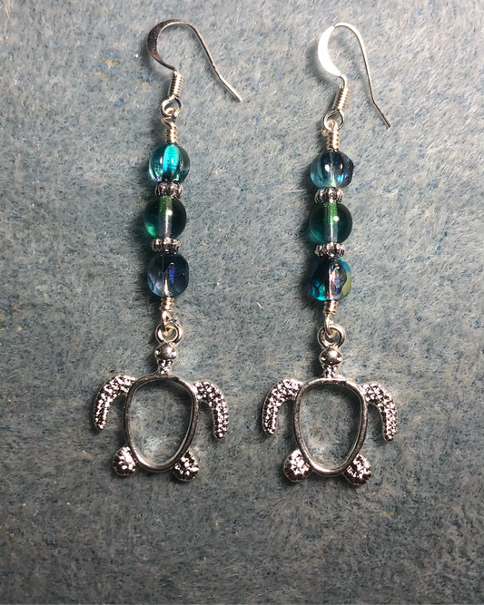 Silver turtle charm earrings adorned with turquoise purple Czech glass beads