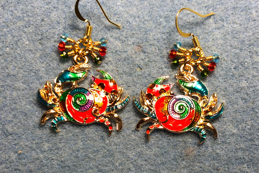 Gold and multicolored enamel crab charm earrings adorned with tiny dangling turquoise, red, and green Chinese crystal beads.
