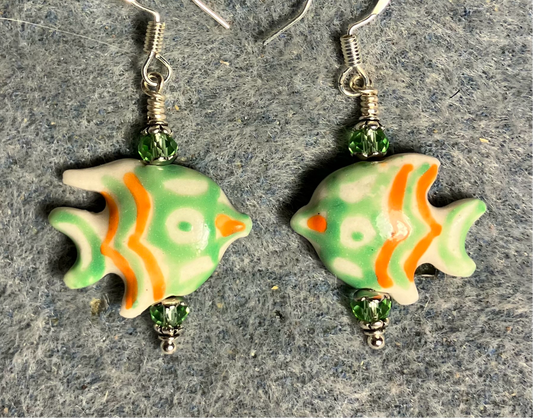 Light green and orange ceramic angelfish bead earrings adorned with light green Chinese crystal beads.