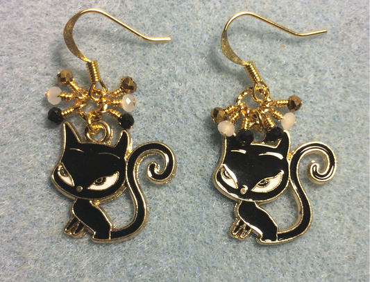 Black, gold, and white enamel fox (or devil cat) charm earrings adorned with tiny dangling black, gold, and white Chinese crystal beads.