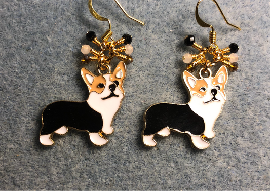 Black, white, and tan enamel corgi charm earrings adorned with tiny dangling black, white, and tan Chinese crystal beads.