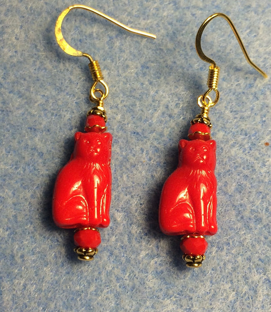 Small opaque red Czech glass cat bead earrings adorned with red Chinese crystal beads.
