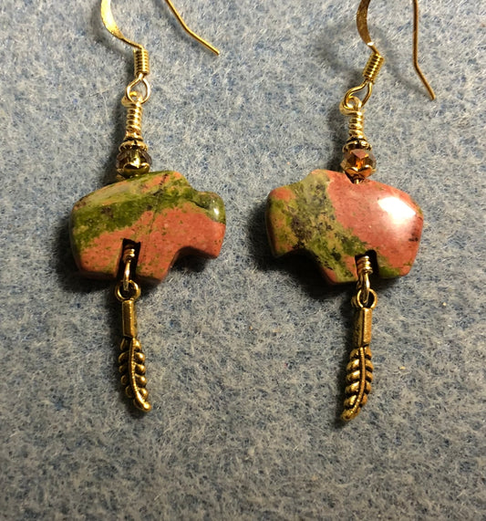 Green and orange unakite gemstone buffalo fetish bead earrings adorned with sparkly green crystal beads and tiny gold feather charms.