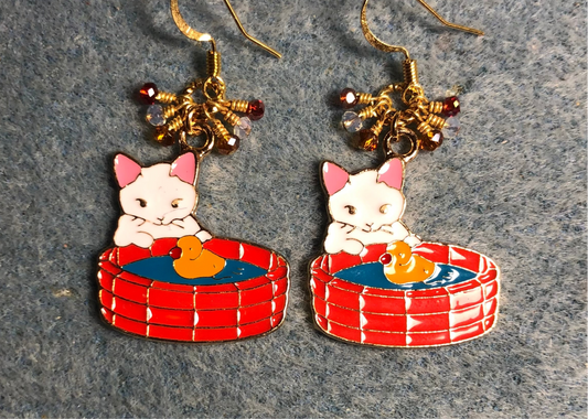 White, pink, red, and amber enamel cat charm earrings adorned with tiny dangling white, red, and amber Chinese crystal beads.