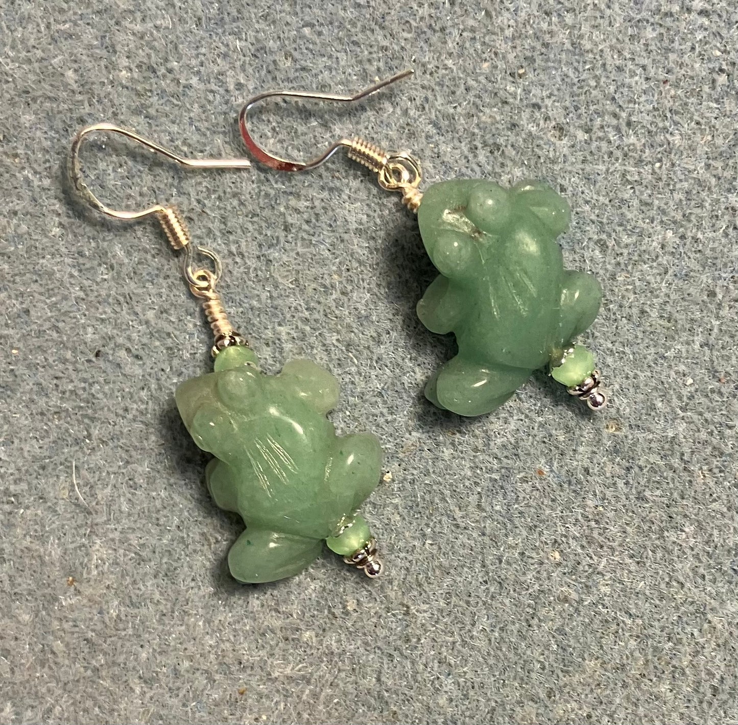 Green aventurine gemstone frog bead earrings adorned with light green Chinese crystal beads.