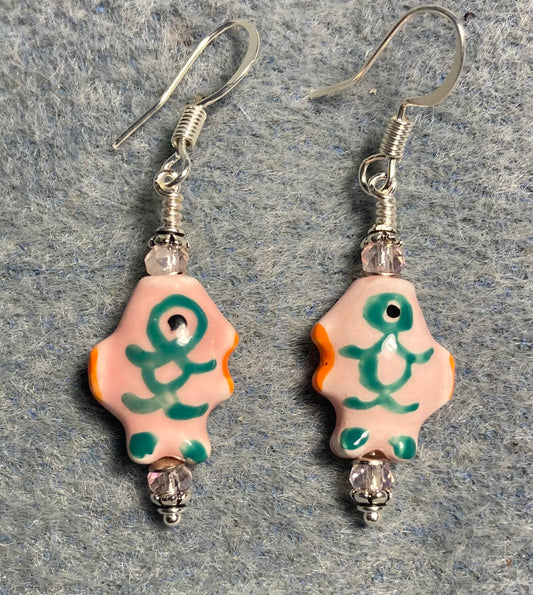 Small light pink and green ceramic fish bead earrings adorned with pink Chinese crystal beads.