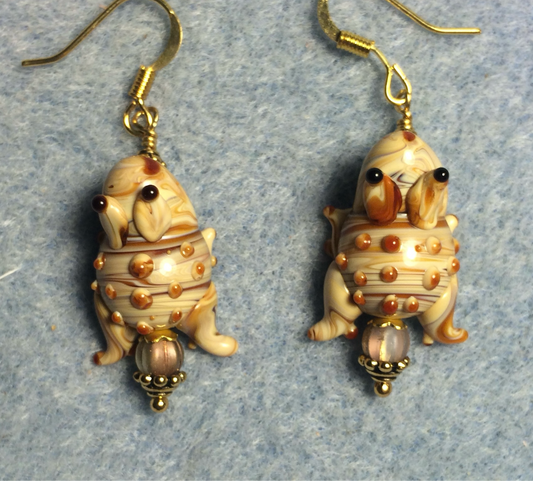Tan lamp work bumpy toad bead earrings adorned with tan Czech glass beads.