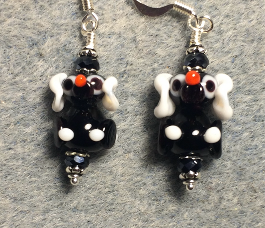Small black and white lamp work puppy dog bead earrings adorned with black Chinese crystal beads.