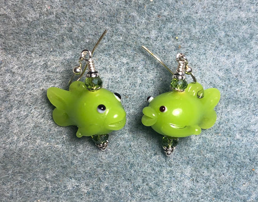 Green lamp work fish bead earrings adorned with green Chinese crystal beads.