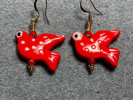 Large red ceramic flying dove bead earrings adorned with red Chinese crystal beads.