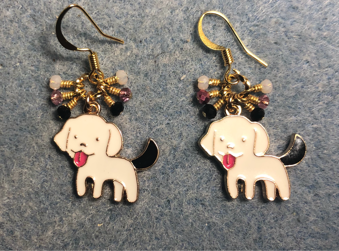 White, black, and pink enamel puppy dog charm earrings adorned with tiny dangling white, black, and pink Chinese crystal beads.