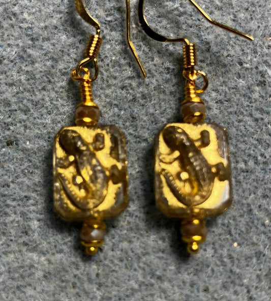 Small gray and gold Czech glass lizard bead earrings adorned with gray Chinese crystal beads.