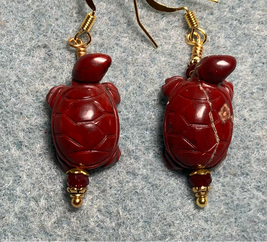 Dark red poppy jasper gemstone turtle bead earrings adorned with dark red Chinese crystal beads.