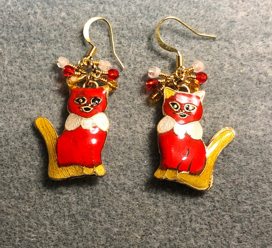Red, amber, and white cloisonné cat charm earrings adorned with small dangling red, amber, and white Czech glass beads.