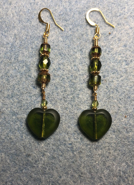 Olive green Czech glass heart bead earrings adorned with olive green Czech glass beads.