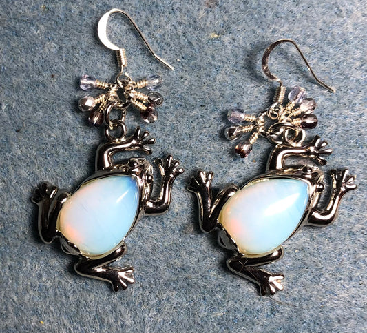 Large silver and opalite gemstone frog charm earrings adorned with small dangling silver, violet, and light blue Czech glass beads.