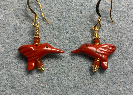 Small poppy jasper gemstone hummingbird bead earrings adorned with small orange Czech glass beads.