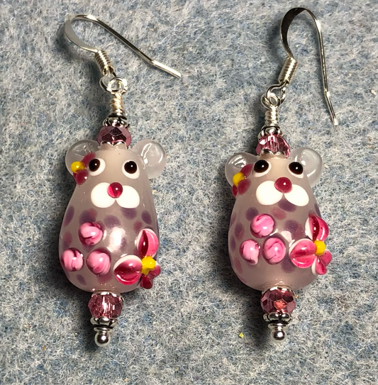 Light pink and hot pink lamp work mouse bead earrings adorned with hot pink Chinese crystal beads.