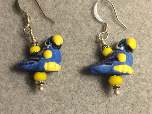 Small blue and yellow ceramic parrot bead earrings adorned with yellow Chinese crystal beads.