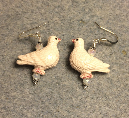 Off white ceramic dove bead earrings adorned with white Chinese crystal beads.