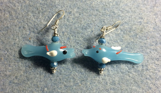 Small light blue and white lamp work fish bead earrings adorned with light blue Chinese crystal beads.