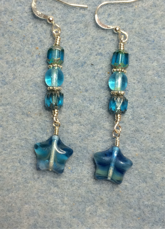 Small translucent striped turquoise Czech glass star bead earrings adorned with turquoise Czech glass beads.