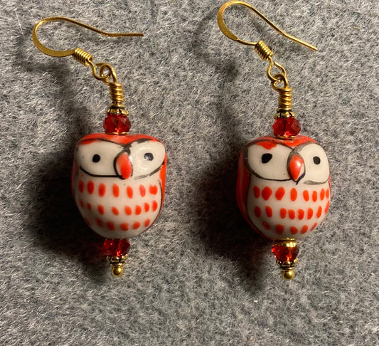 Bright red ceramic spotted owl bead earrings adorned with red Chinese crystal beads.