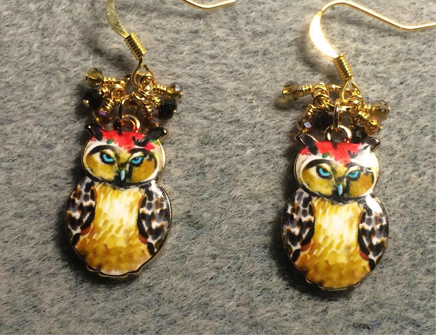 Amber, black, and gray enamel owl charm earrings adorned with tiny dangling amber, black, and gray Chinese crystal beads.