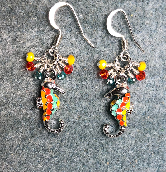 Silver, yellow, orange, and aqua enamel seahorse charm earrings adorned with tiny dangling yellow, orange, and aqua Chinese crystal beads.