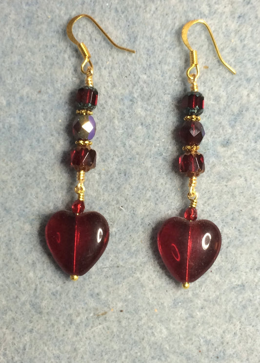 Ruby red Czech glass heart bead earrings adorned with ruby red Czech glass beads.